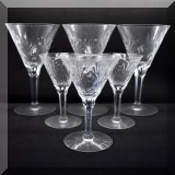 G46. 7 Cut crystal wine goblets with design of palm fornds and polka dots. 6”h - $21 